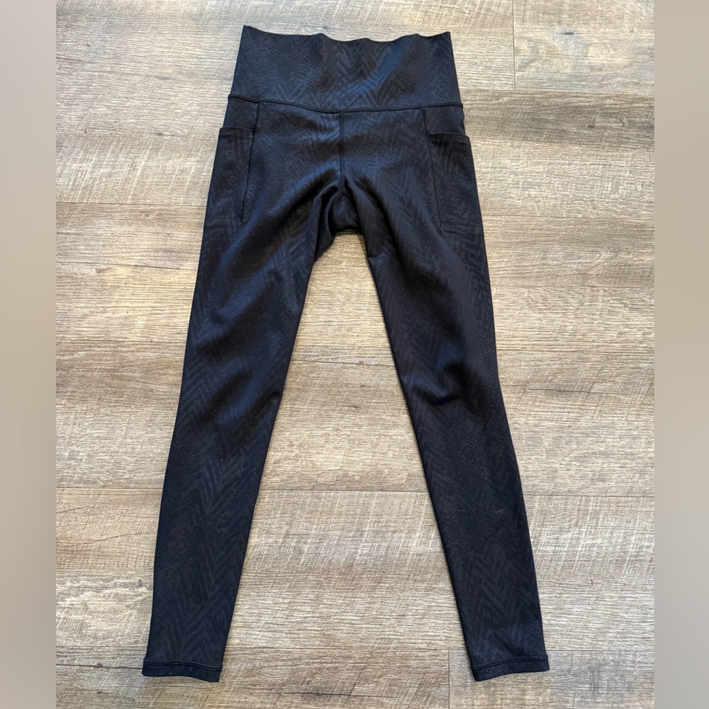Athleta salutation stash tight